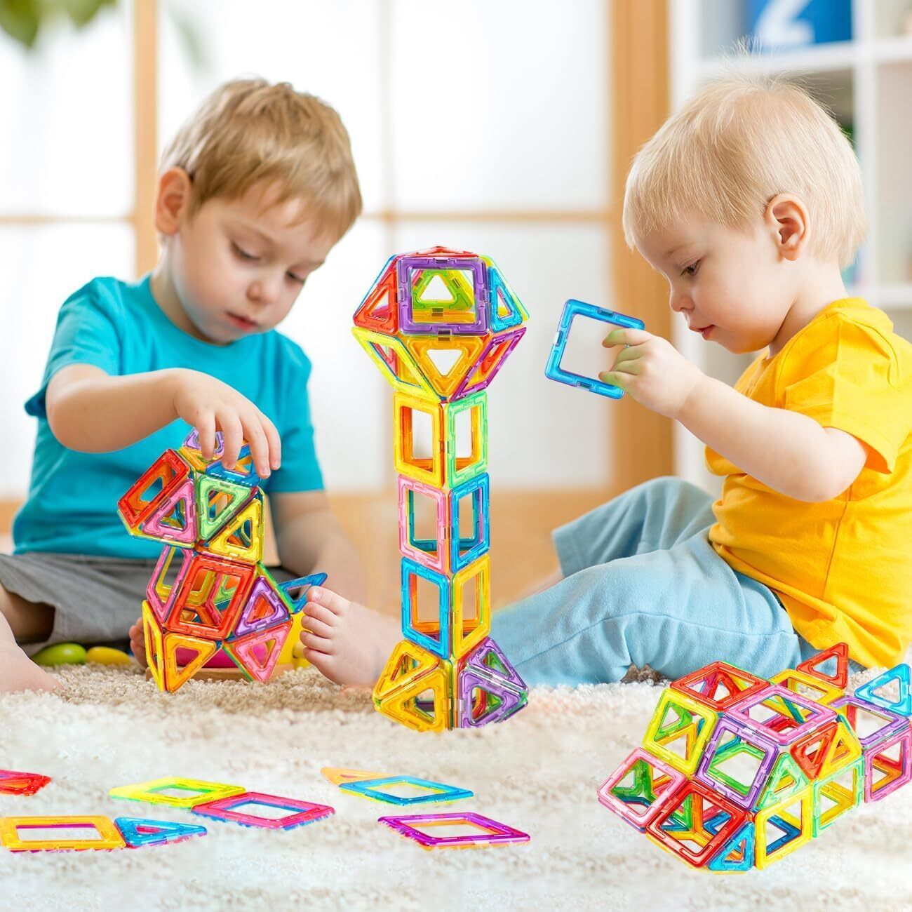 Two Kids Playing with Magnetic Building Blocks