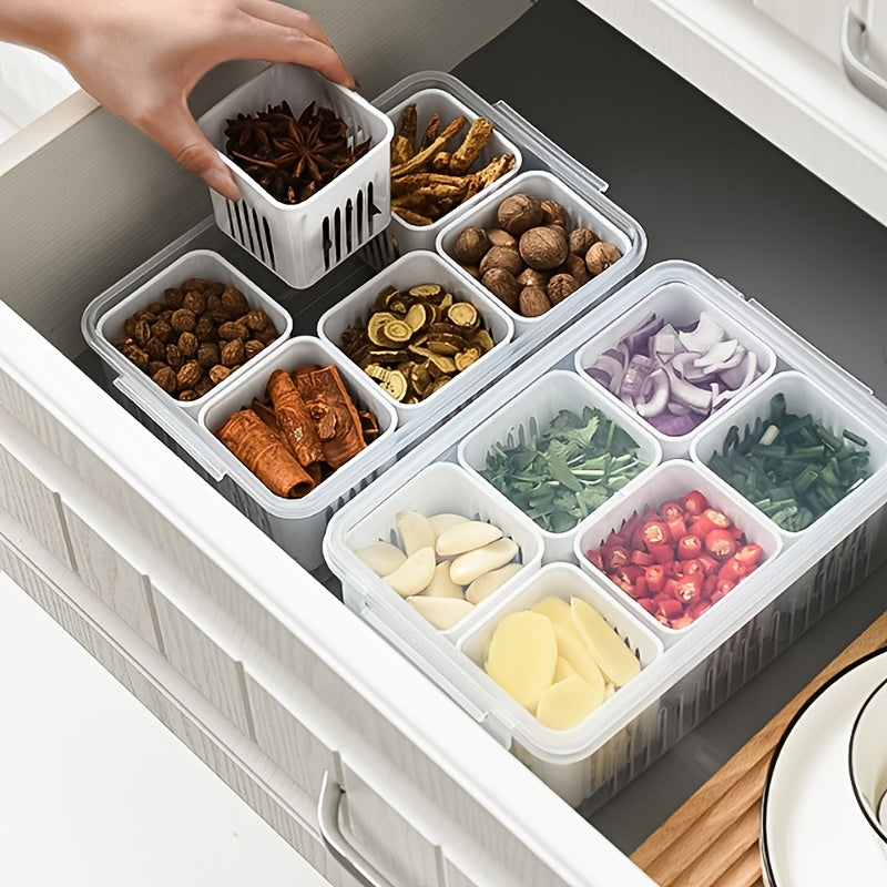 Kitchen drawer with spice organizer containing various dried herbs and spices.