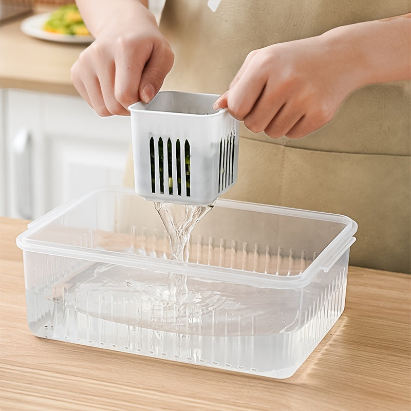 Person using a kitchen tool to drain water from a container on a wooden table.