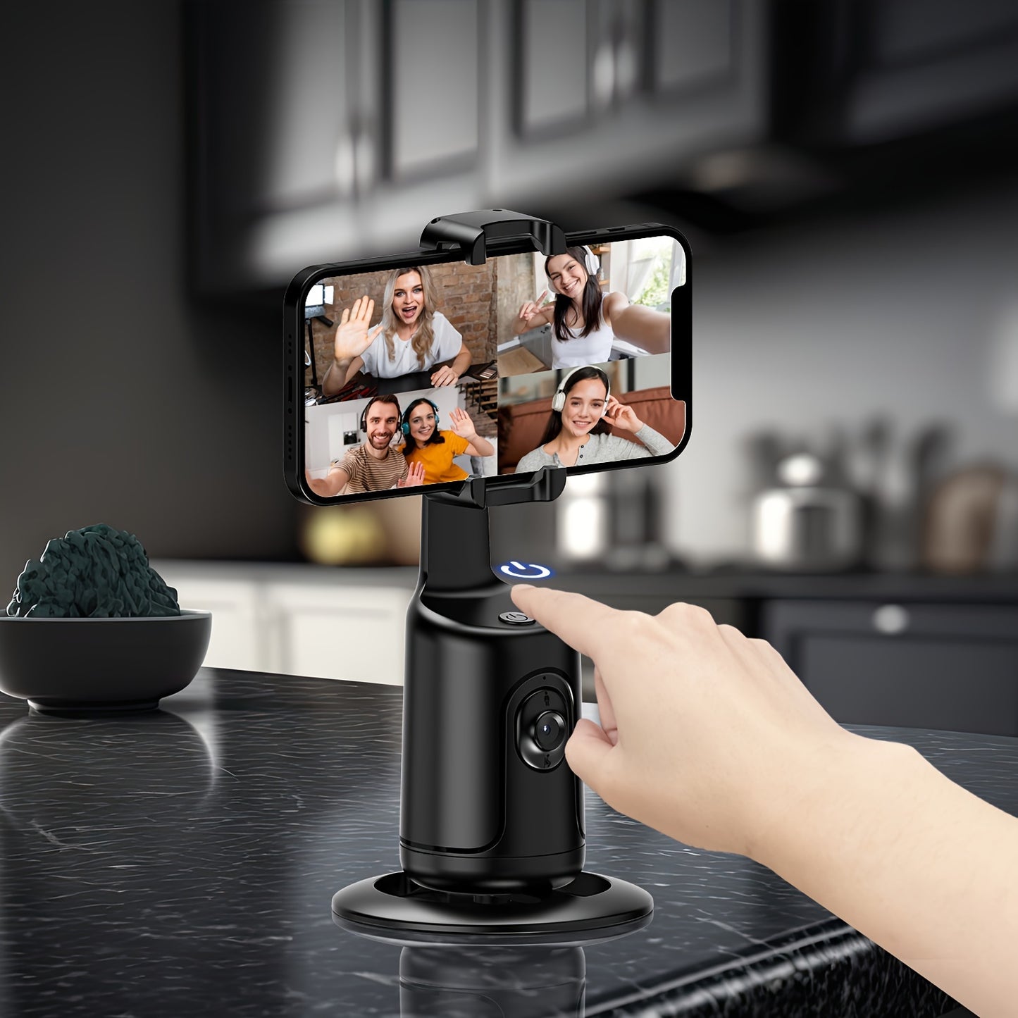 Smartphone with a multi-device screen on a stand, displaying multiple video calls in a kitchen setting.