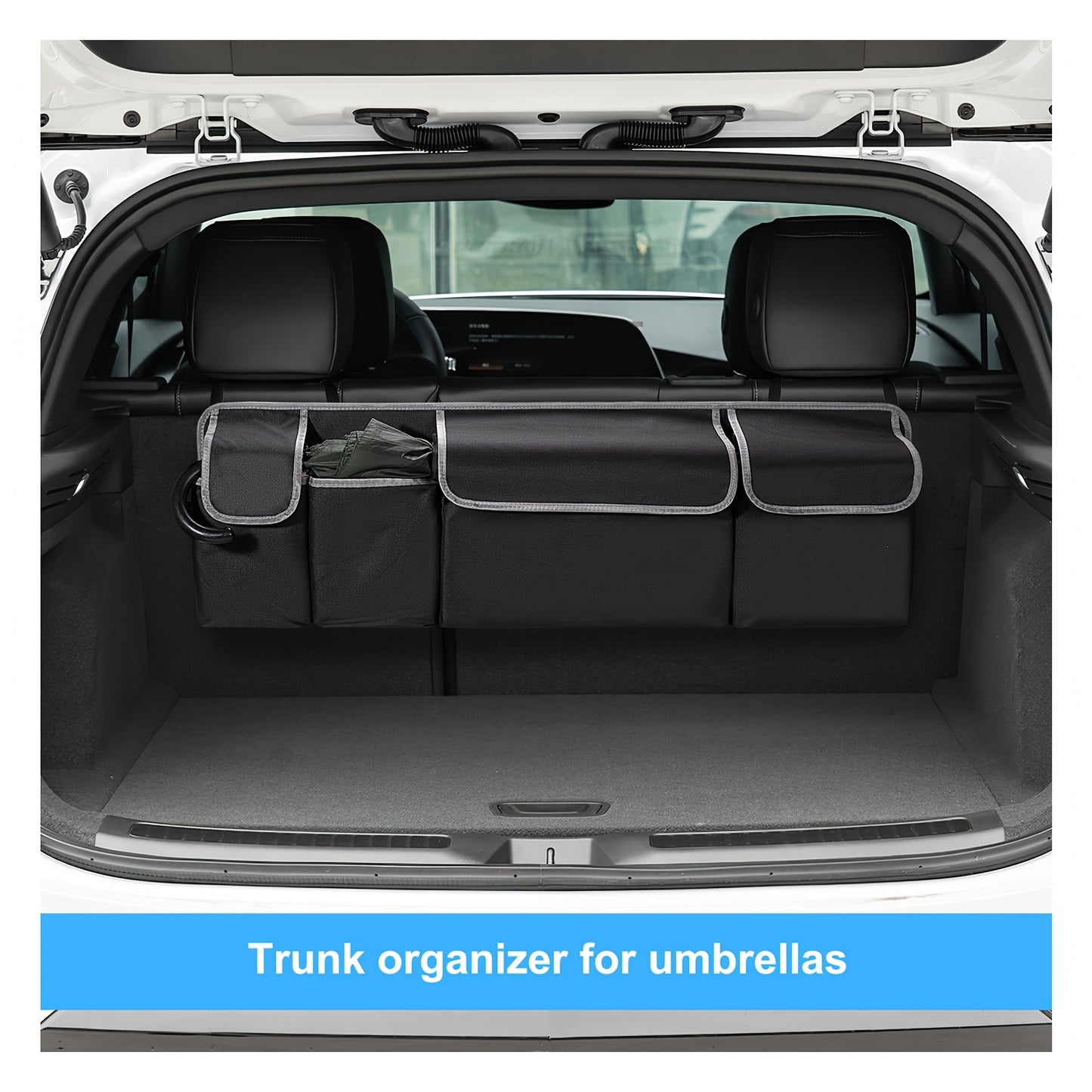 Trunk organizer for umbrellas installed in a car trunk.