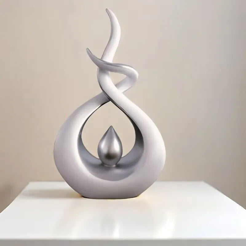 Decorative sculpture with a spiral design on a neutral background