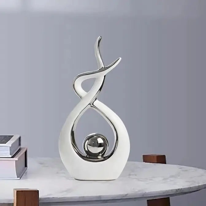 Decorative sculpture on a marble surface with a plain background