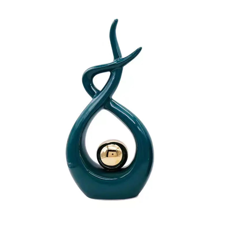 Teal decorative object with a gold center on a white background