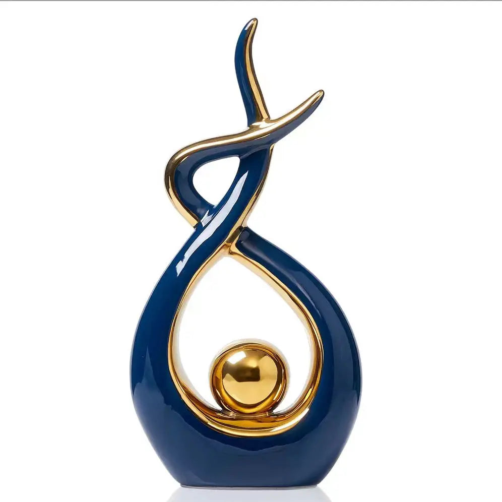 Decorative sculpture with blue and gold design on a white background