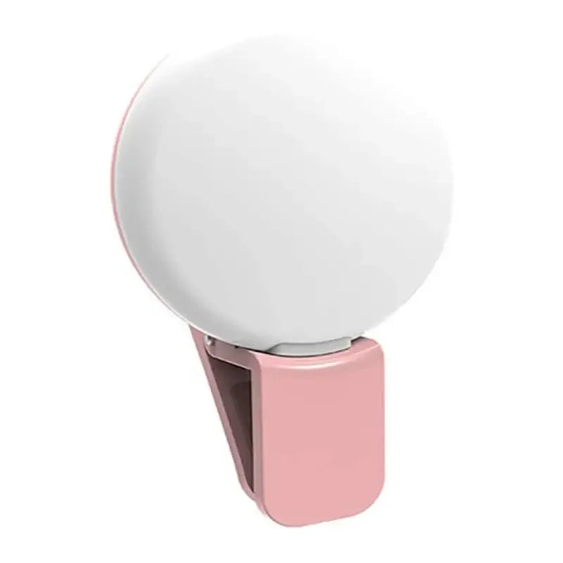 White spherical object with a pink base on a white background