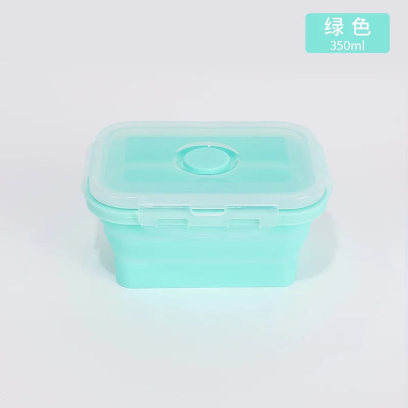 Green silicone food container on a light gray background