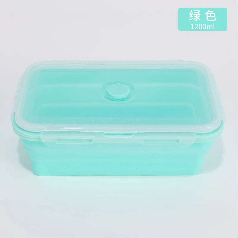 Green silicone container with a lid on a light gray background
