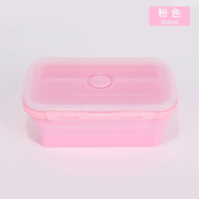 Pink plastic container with a white lid on a light gray background