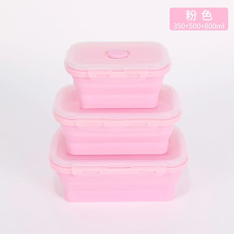 Set of pink silicone containers with different capacities on a white background