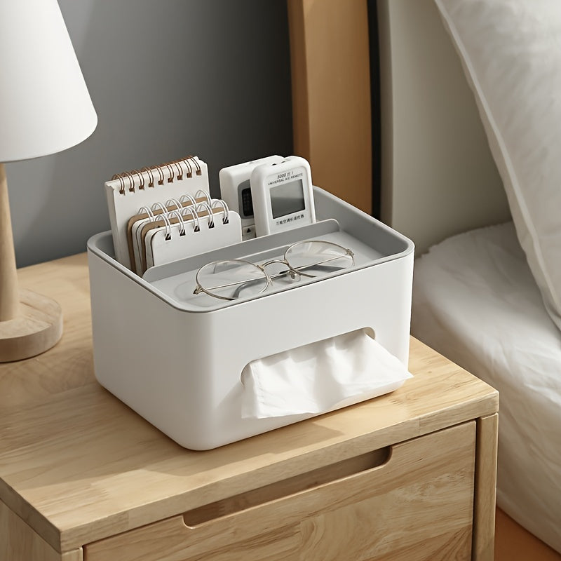 White organizer with stationery items on a wooden nightstand