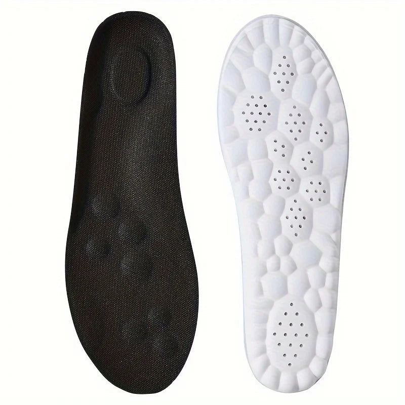 Black and white shoe insoles on a white background