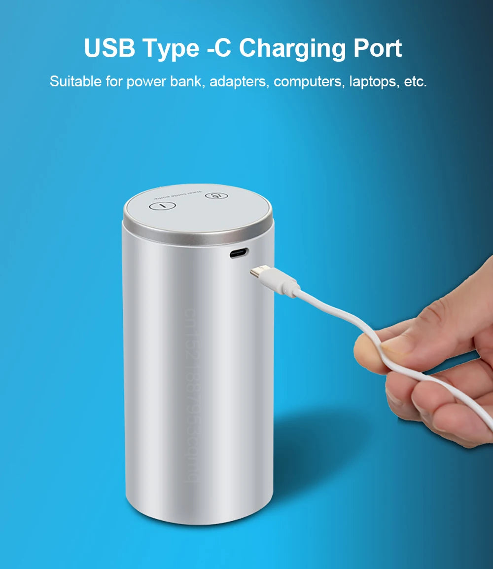 Silver cylindrical device with USB Type-C charging port on a blue background