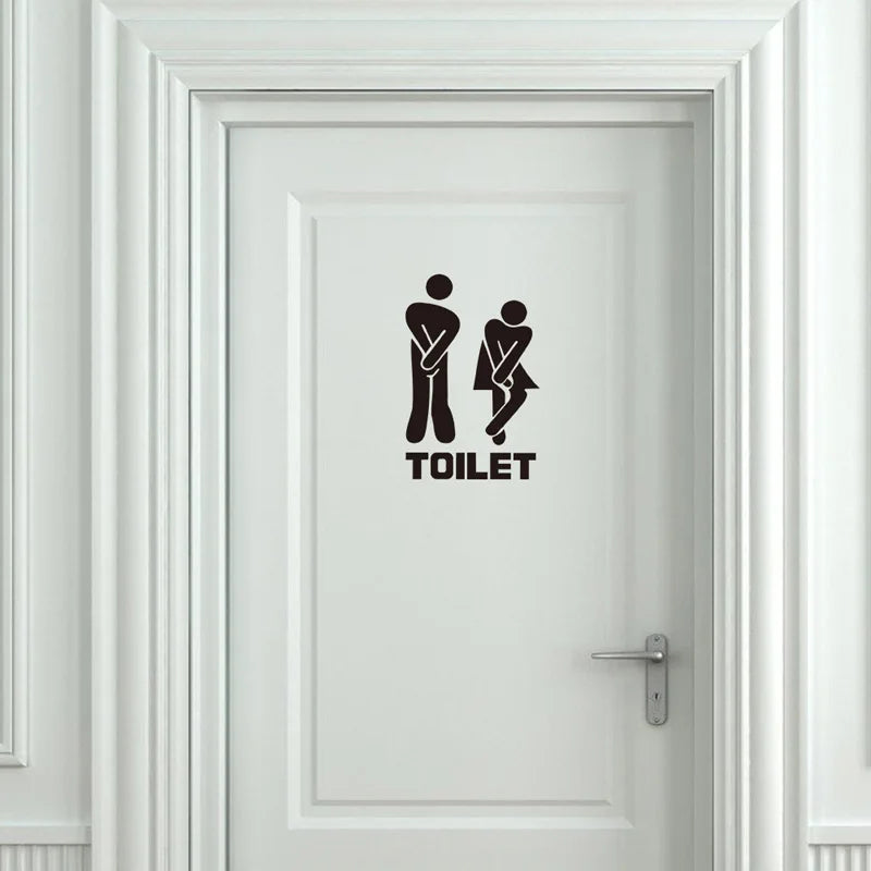 White door with black 'TOILET' and icon decal on a white background