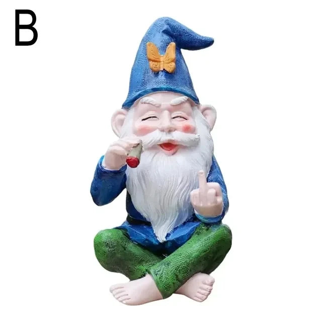 Gnome figurine with blue hat and green pants on a white background