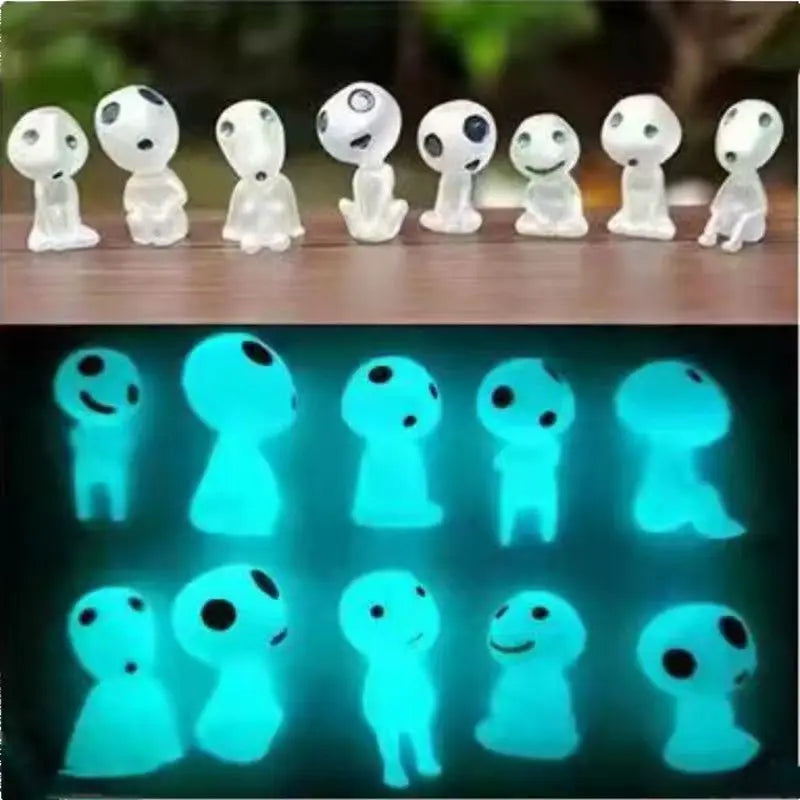 Set of small figures on a wooden surface, with a glowing effect shown below.
