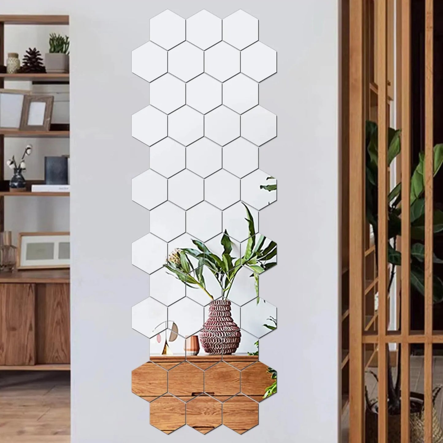 Hexagonal mirror wall decal on a white wall with a room in the background