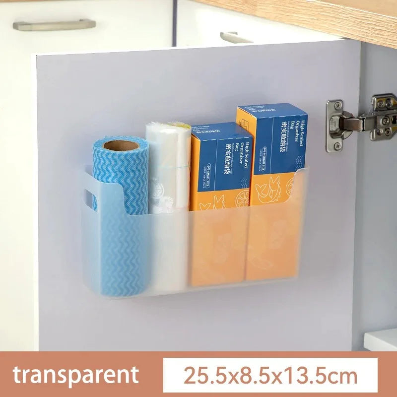 Cabinet organizer with rolls of paper and boxes inside, showing dimensions.