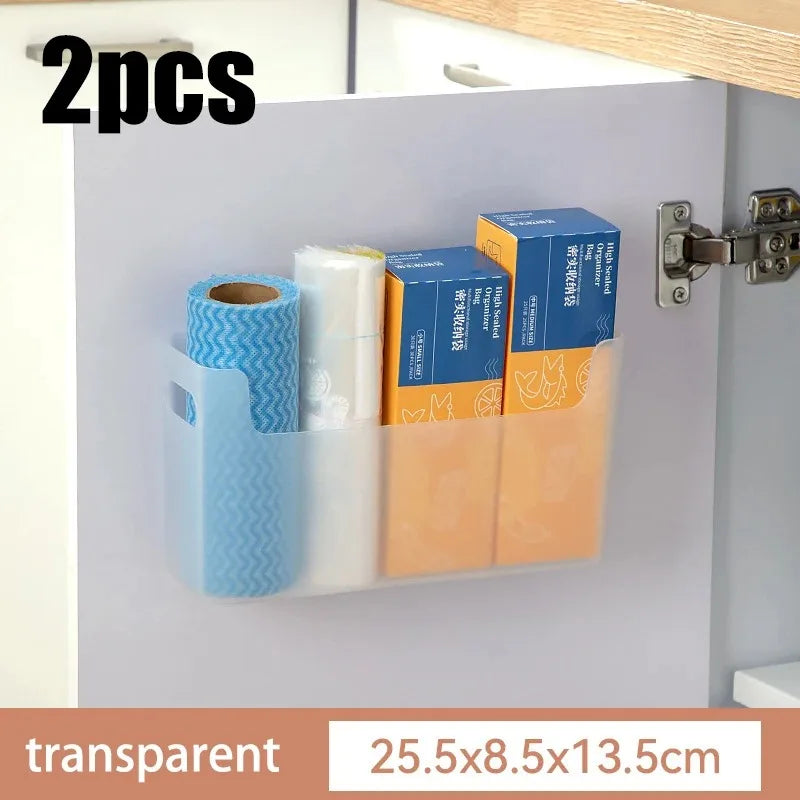 Transparent roll of paper held by a holder inside an open cabinet.