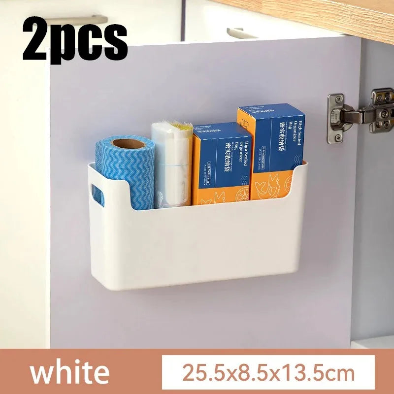 White cabinet organizer with supplies inside, attached to a kitchen cabinet.
