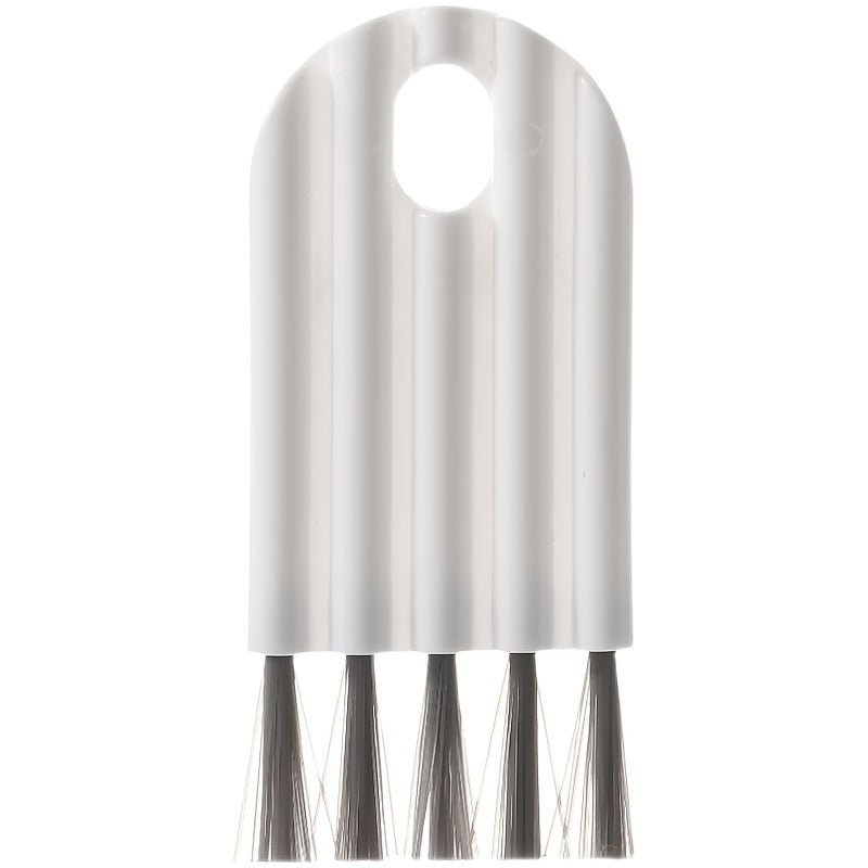 Metallic brush with bristles on a white background