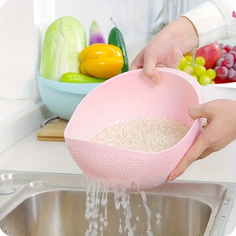 Person washing rice in a pink colander over a sink with fruits and vegetables in the background.