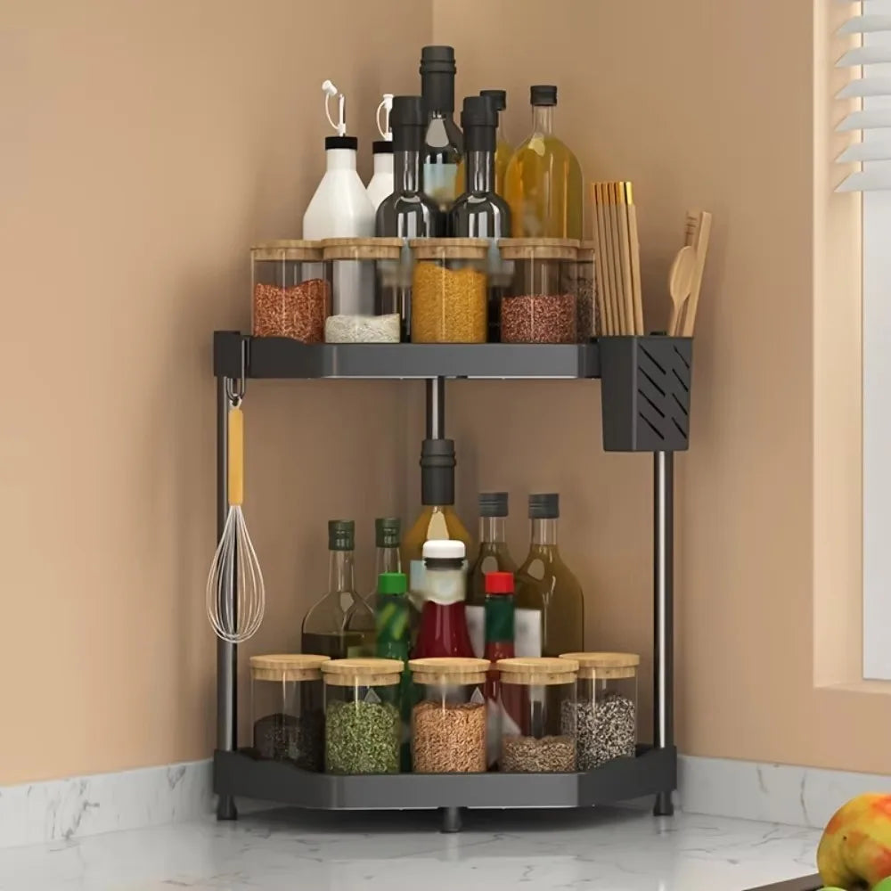 Kitchen storage rack with bottles, jars, and utensils against a beige wall.