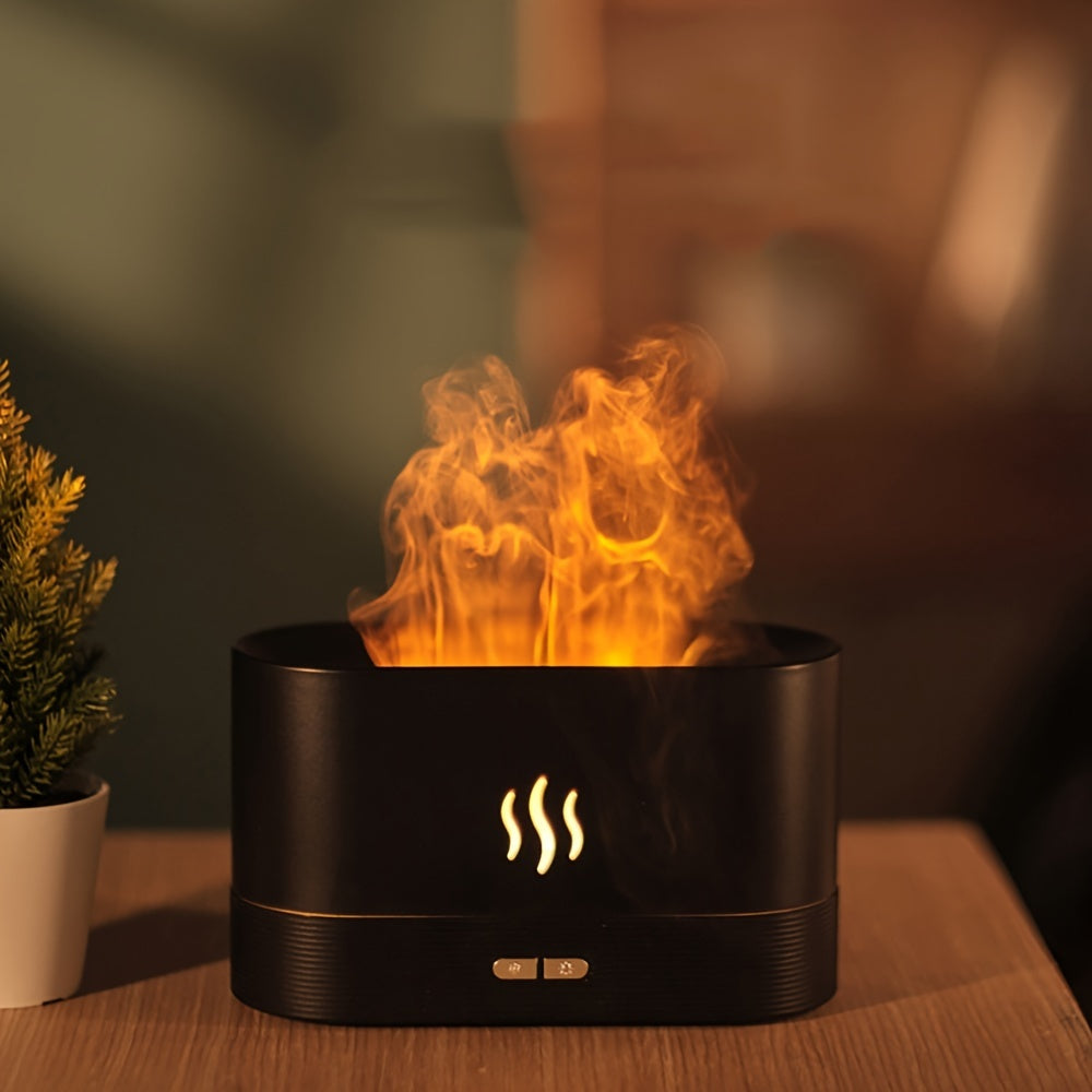 Black flameless candle with glowing flames on a wooden surface next to a potted plant.