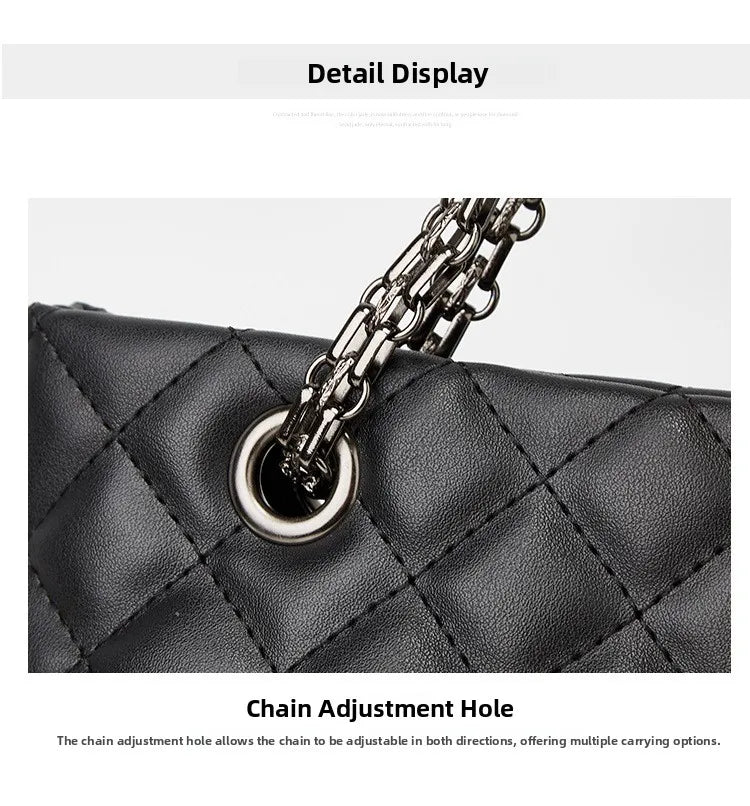 Black quilted handbag with chain detail on a white background