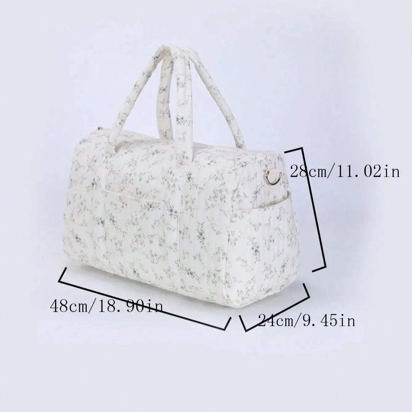 White floral-patterned handbag with measurements on a light gray background