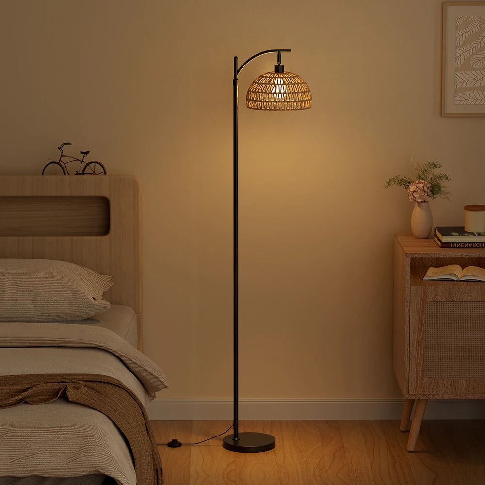 Floor lamp with wicker shade in a bedroom setting