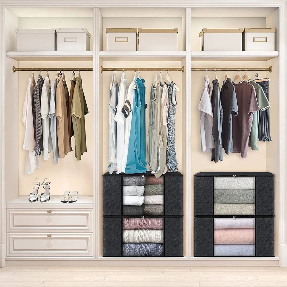 Organized closet with clothes hanging and folded in black cube organizers.
