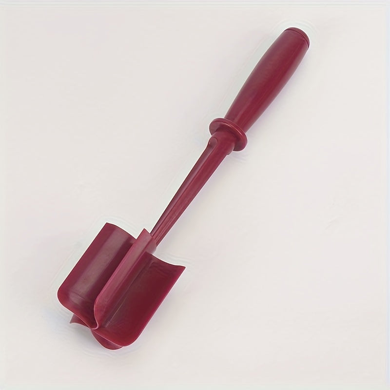 Red plastic tool on a white background