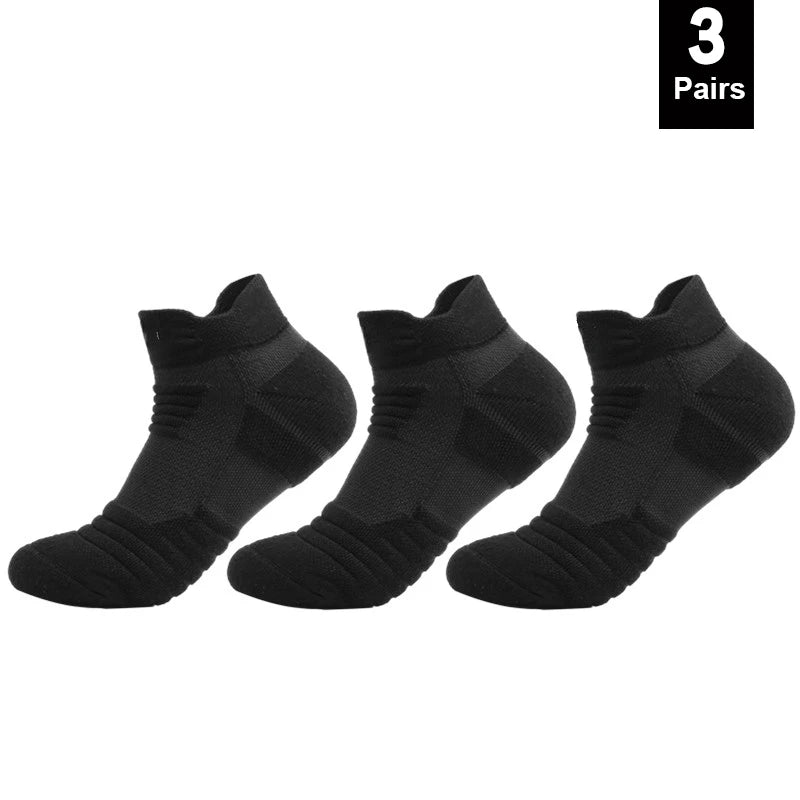 Three pairs of black ankle socks on a white background with a label indicating '3 Pairs'.
