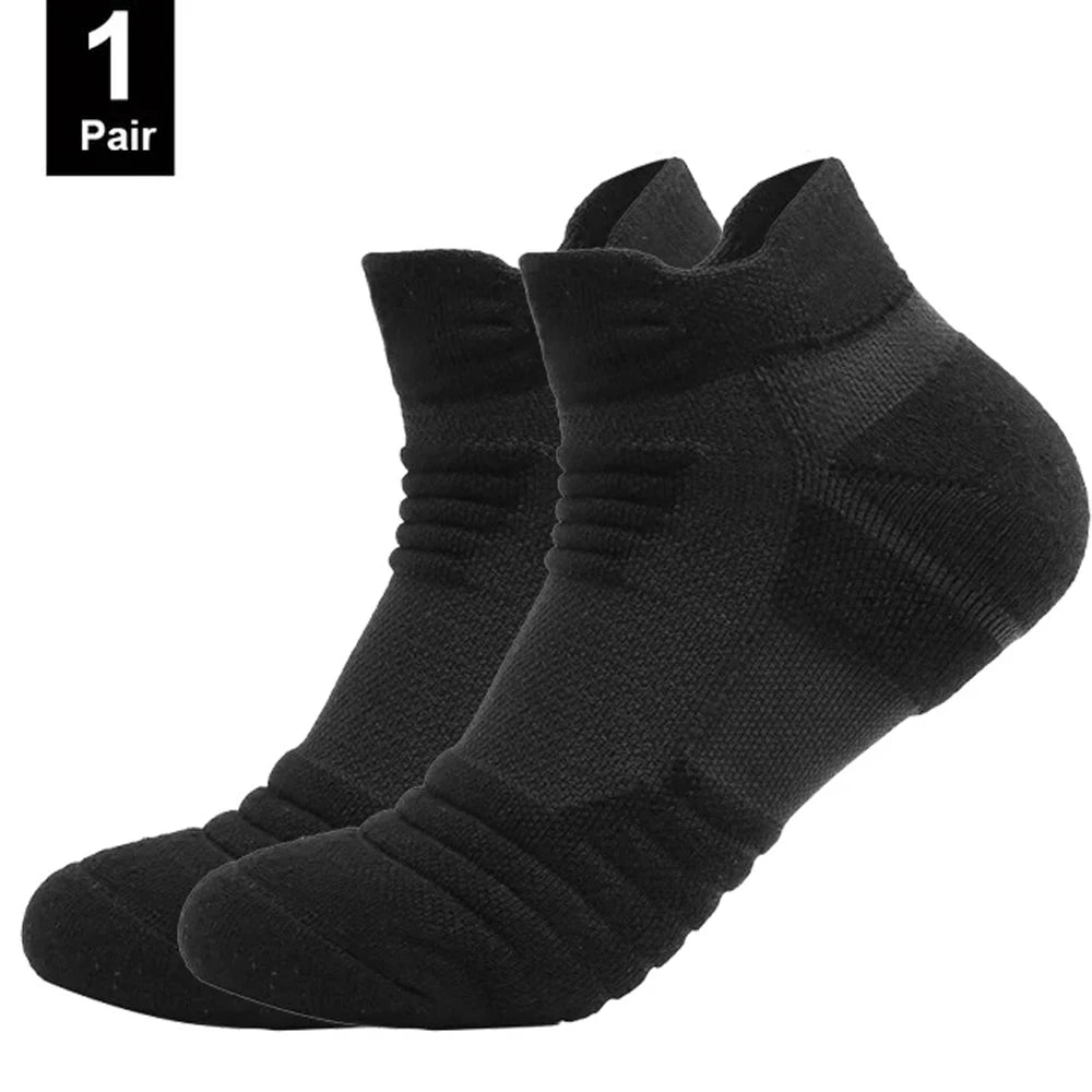 Two black ankle socks on a white background with '1 Pair' text.