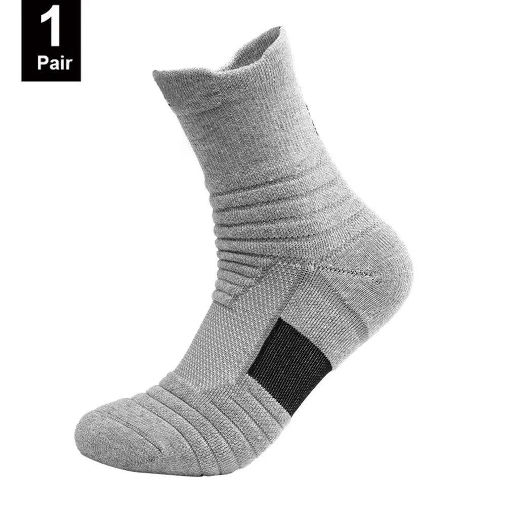 Gray sock with a black patch on a white background