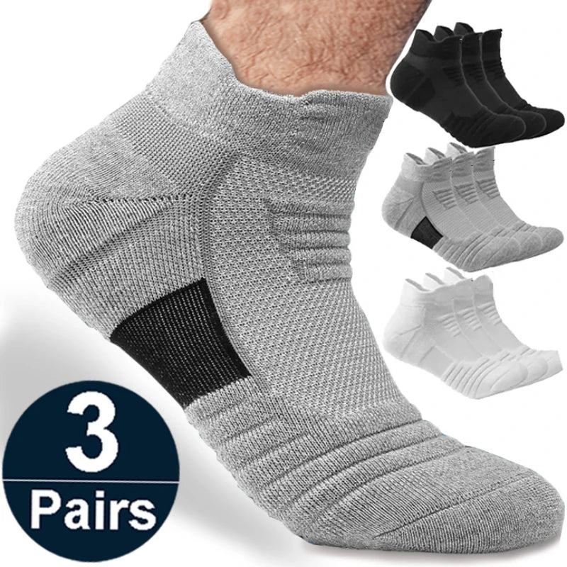 Gray ankle sock with black accents, shown with three pairs of socks on a white background.