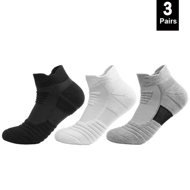 Three pairs of black, white, and gray ankle socks on a white background with '3 Pairs' text.