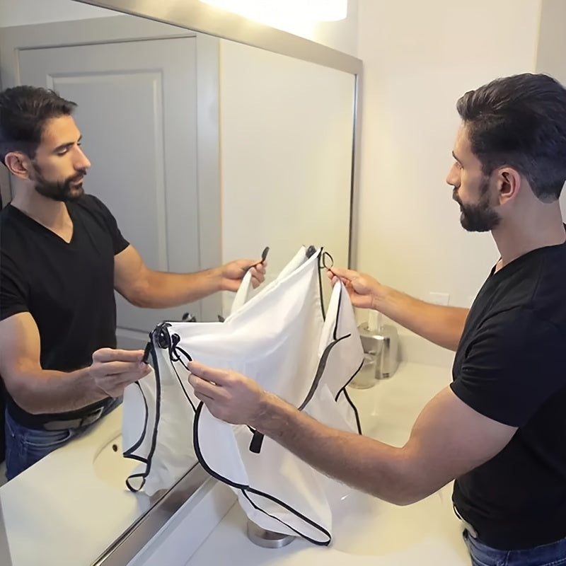 Man using a hairdressing mirror with a white cover in a bathroom.