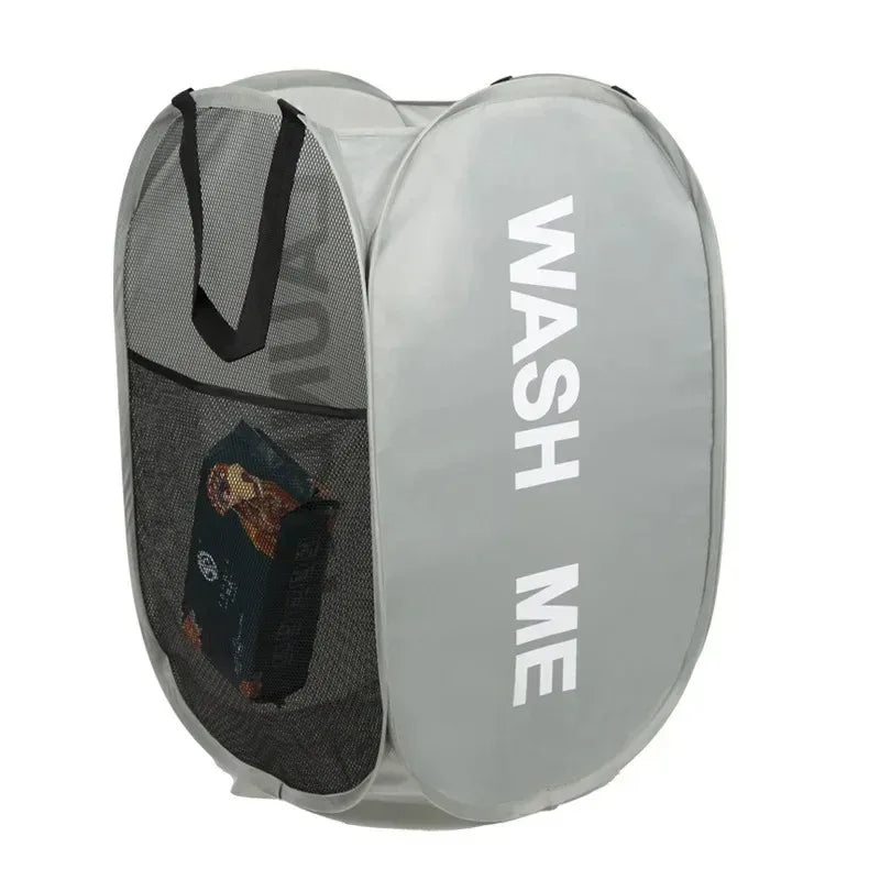 Gray laundry bag with mesh side and 'WASH ME' text on a white background