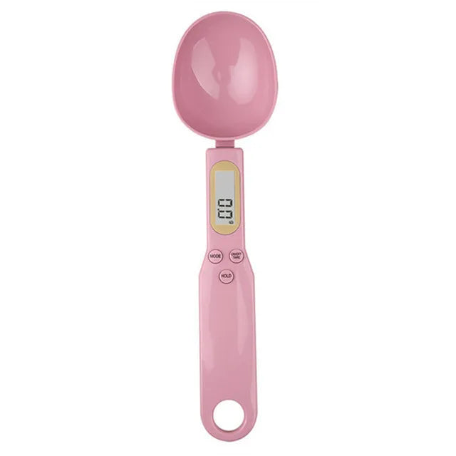 Pink digital measuring spoon on a white background