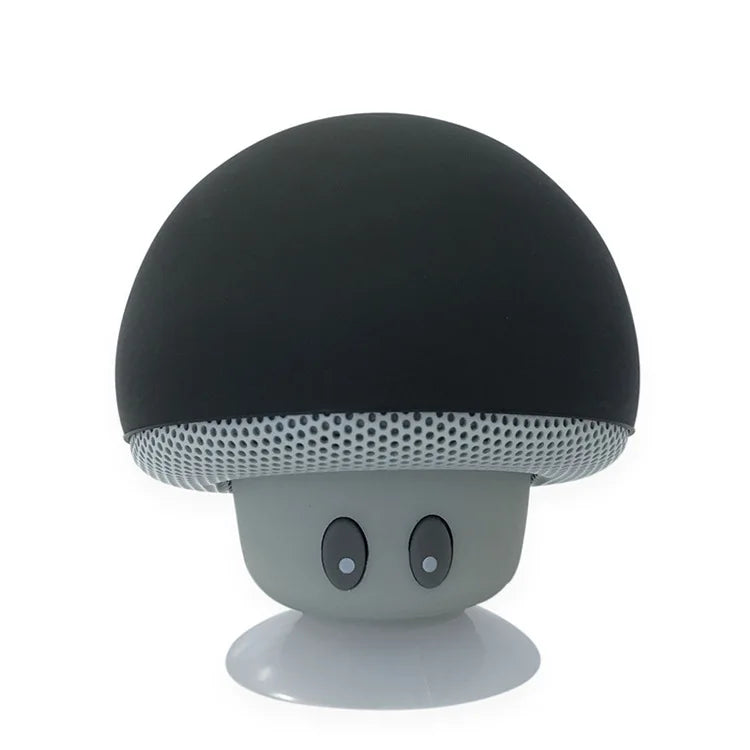 Mushroom-shaped speaker with black top and gray body on a white background