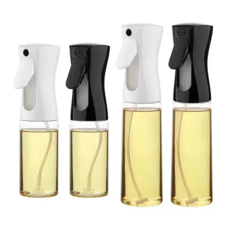 Four spray bottles with black and white nozzles on a white background