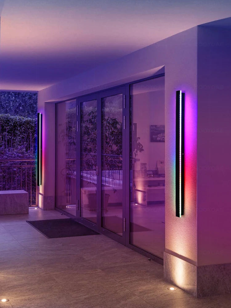 Modern outdoor area with colorful LED lights on walls and ceiling