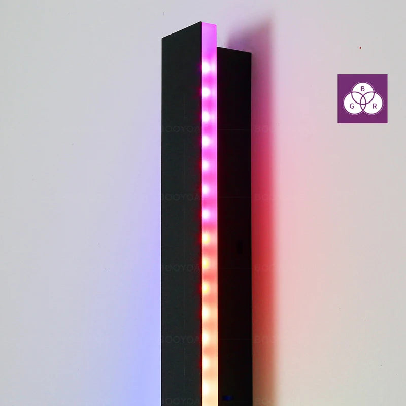 Black rectangular light fixture with RGB LED strip on a white background