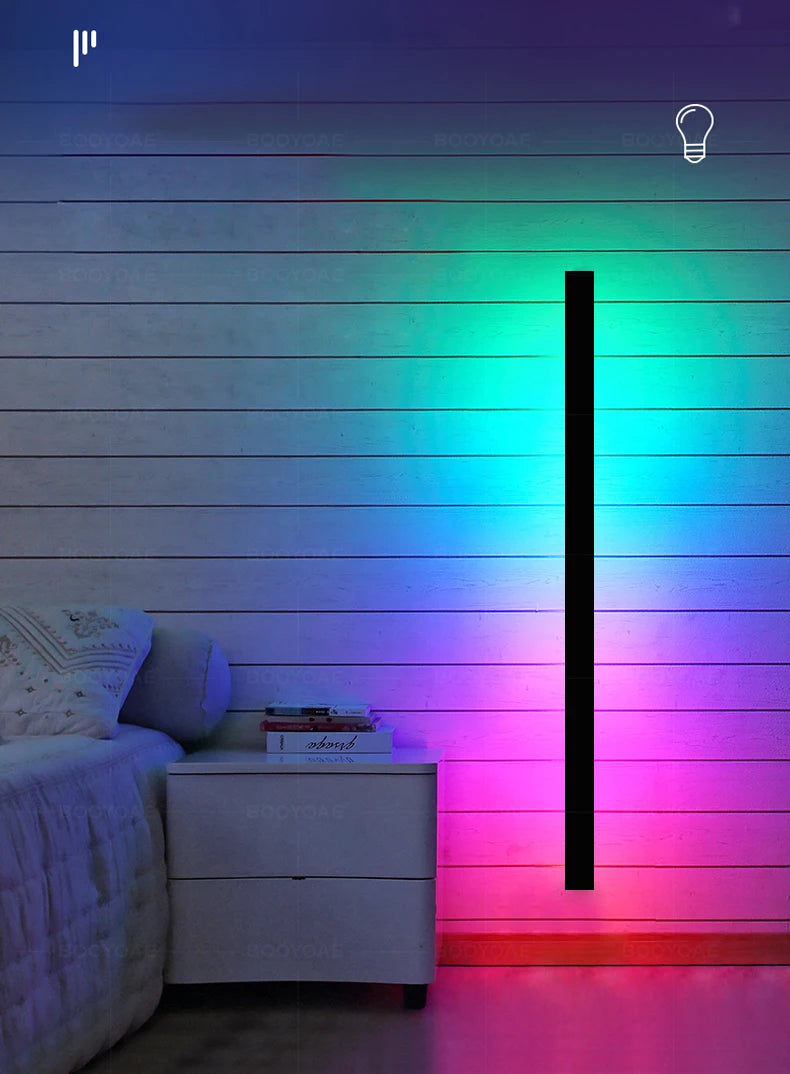 Colorful LED strip light on a wooden wall with a bed and nightstand in the background.