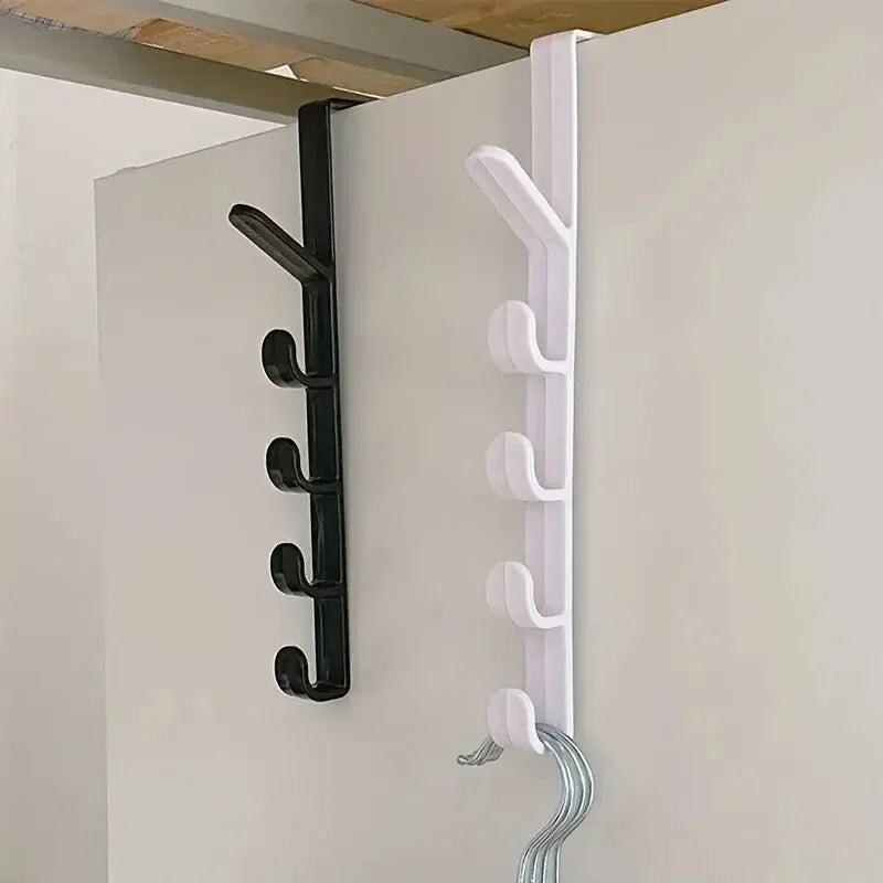 Black and white wall-mounted hook racks on a plain background