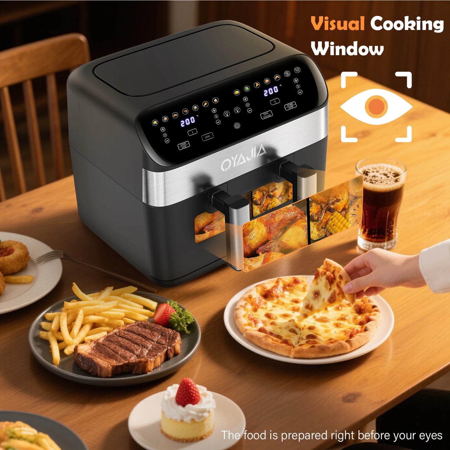 Oyaja air fryer on a table with various foods and a glass of beer, highlighting the 'Visual Cooking Window' feature.