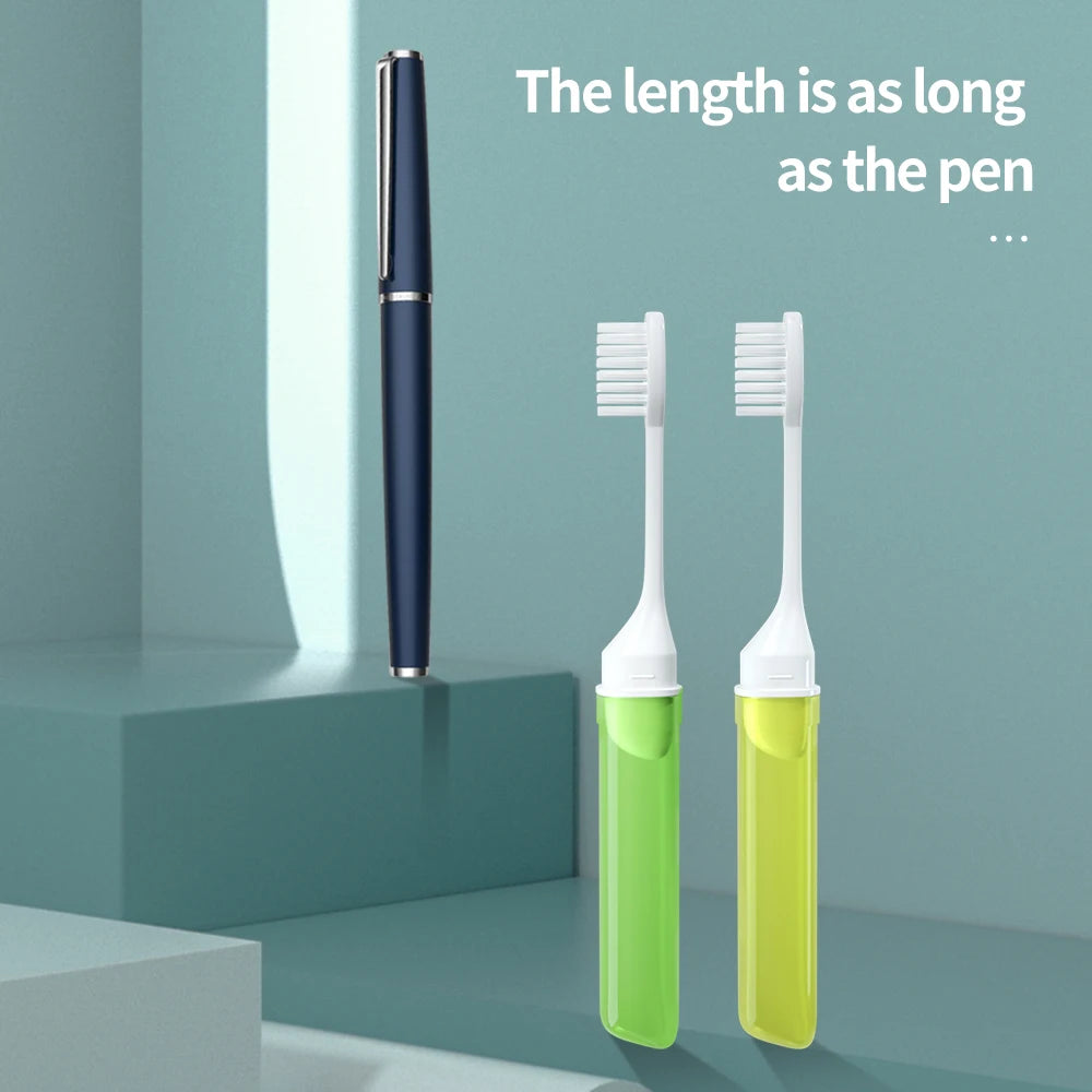 Two green electric toothbrushes with white bristles next to a pen on a light blue background.