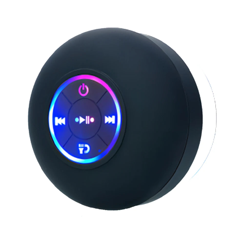 Black circular control with colorful button layout on a white background
